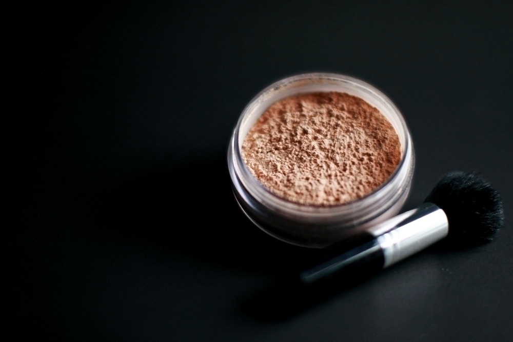 makeup powder with powder brush